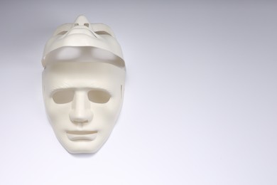 Theater arts. Two masks on white background, top view. Space for text