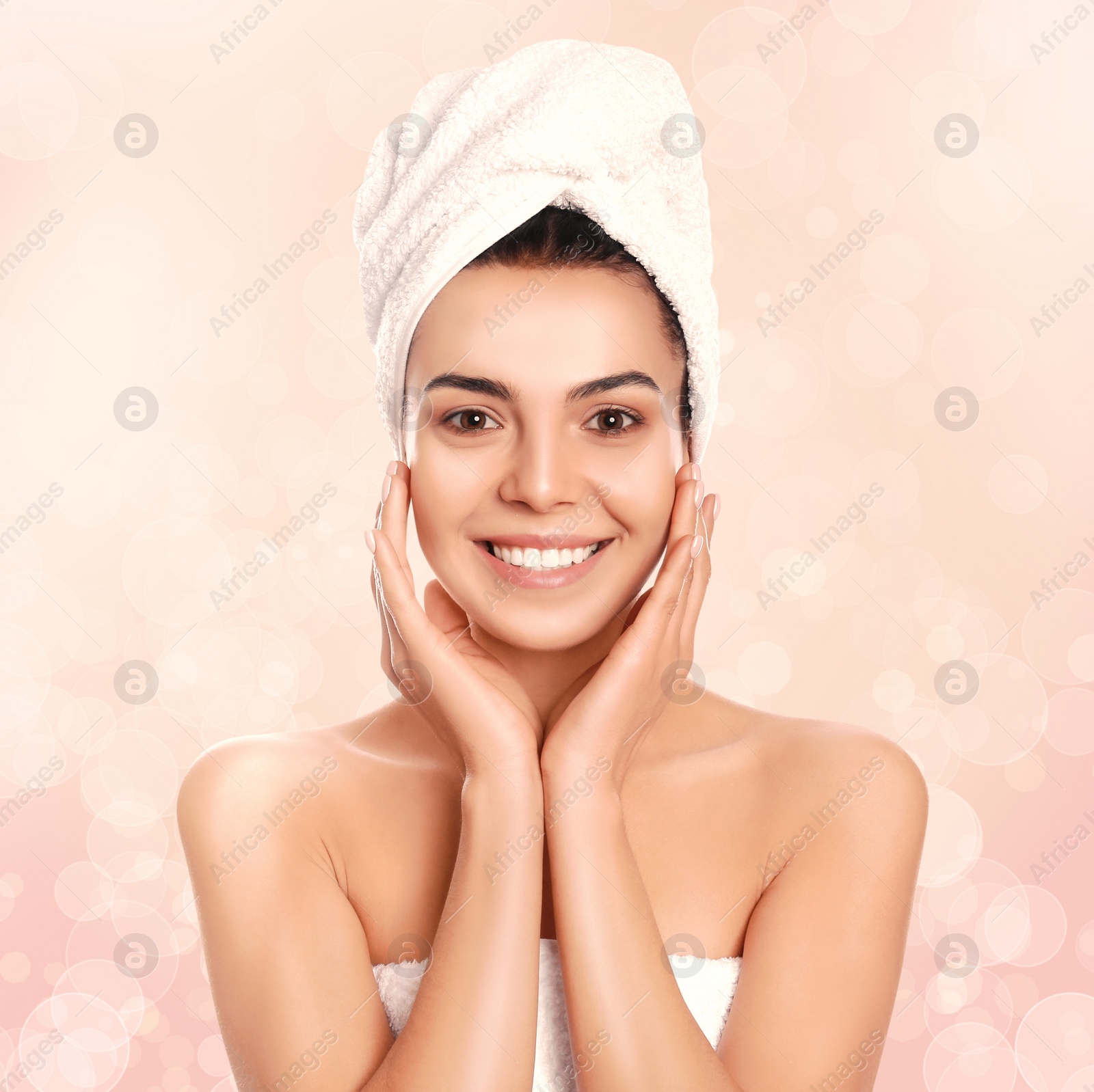 Image of Beautiful young woman with silky skin on light background. Spa treatment 