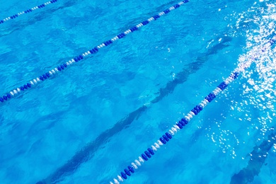 Image of Swimming pool with racing lane dividers, closeup view