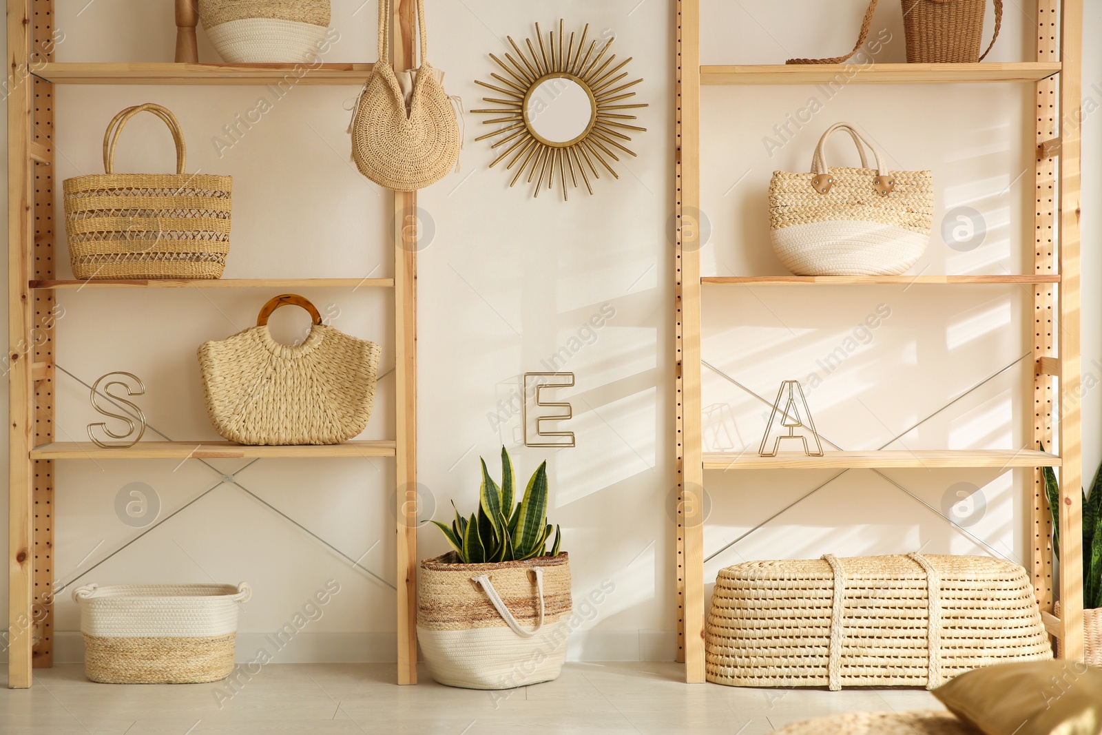 Photo of Stylish woman's bags on shelves in boutique