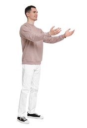 Full length portrait of handsome young man on white background