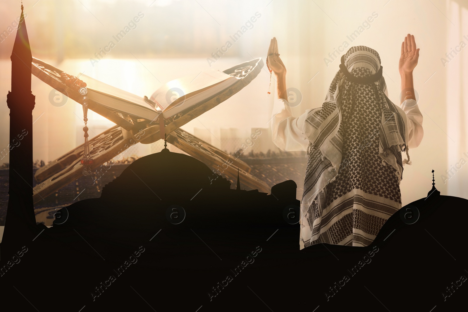 Image of Multiple exposure of Muslim man praying, silhouette of mosque and stand with Koran