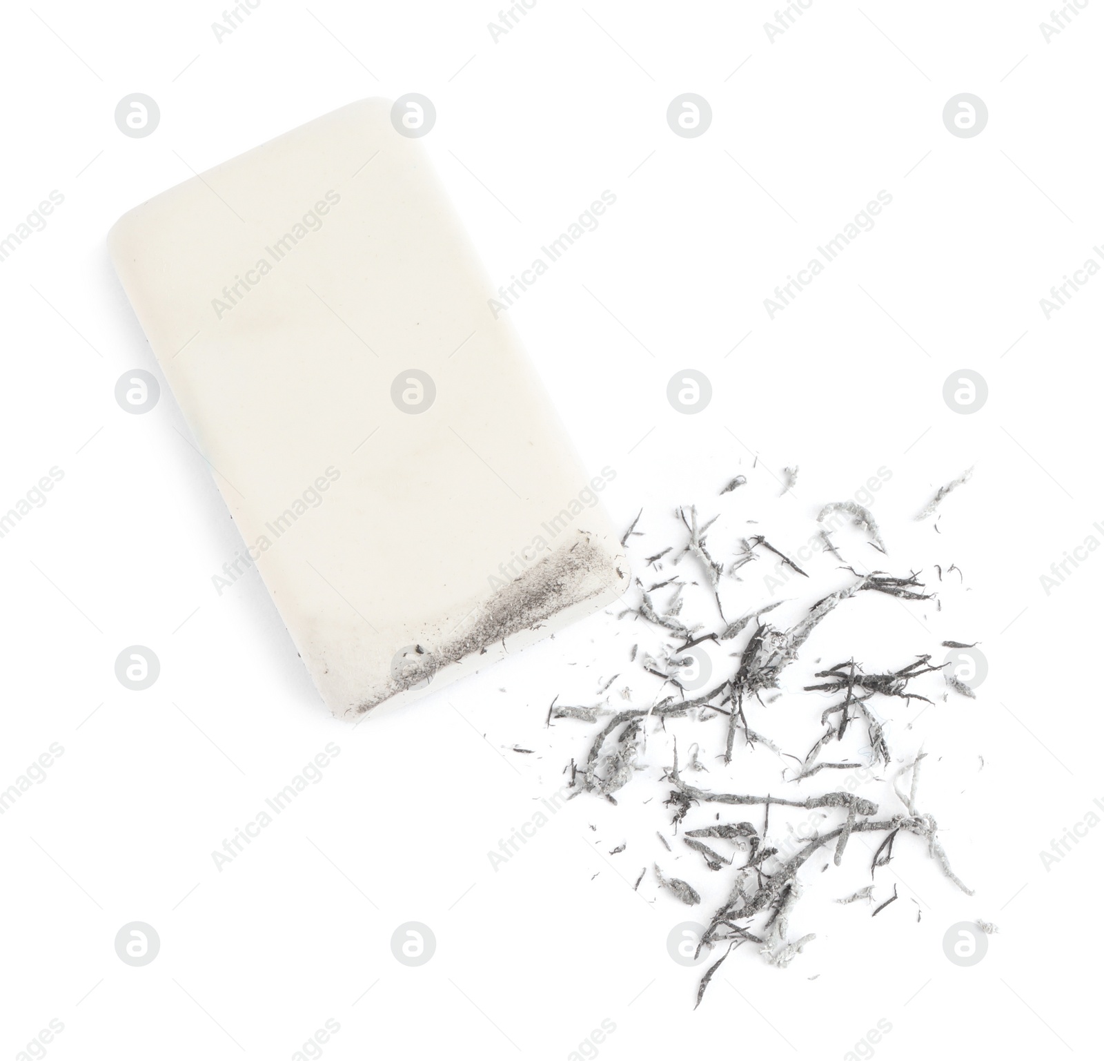 Photo of Eraser and crumbs on white background, top view
