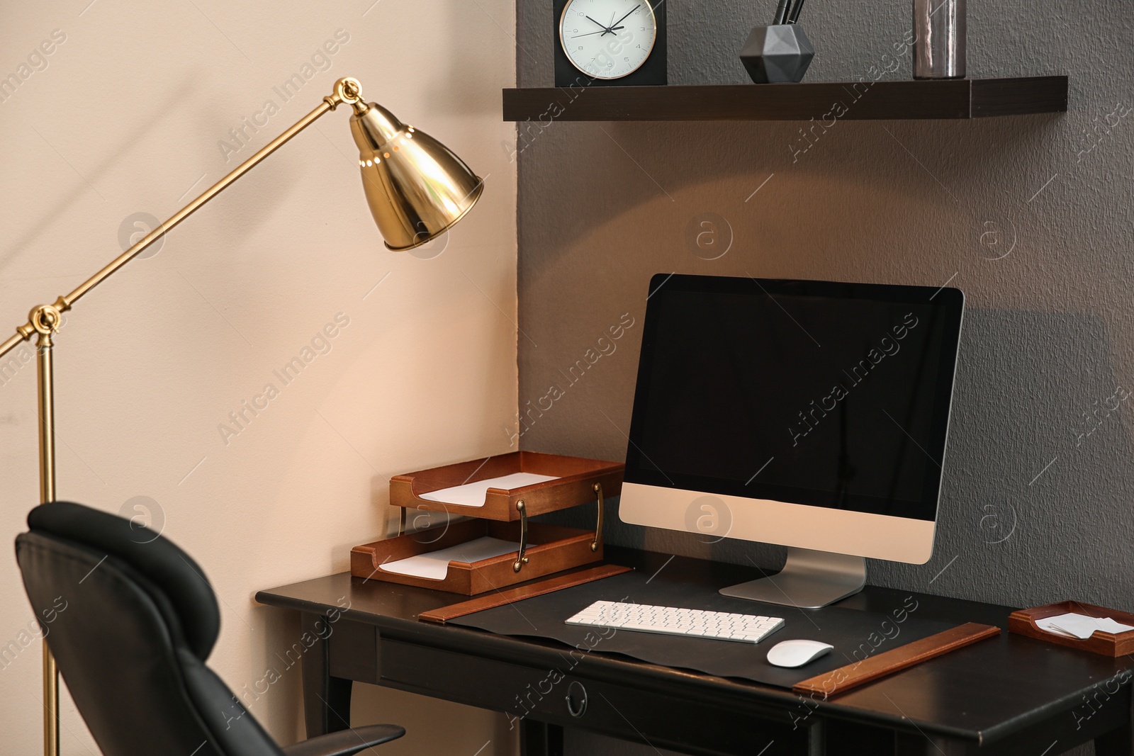 Photo of Modern interior of working place with computer