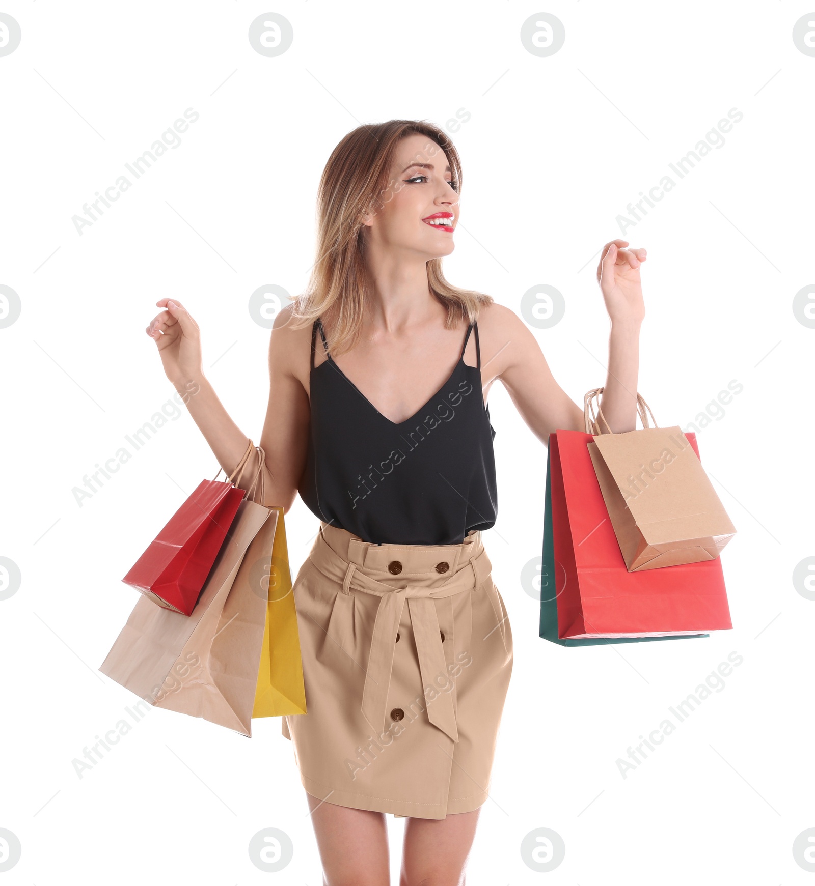 Photo of Beautiful young woman with shopping bags on white background