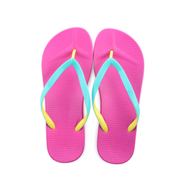 Pair of stylish pink flip flops isolated on white, top view. Beach object