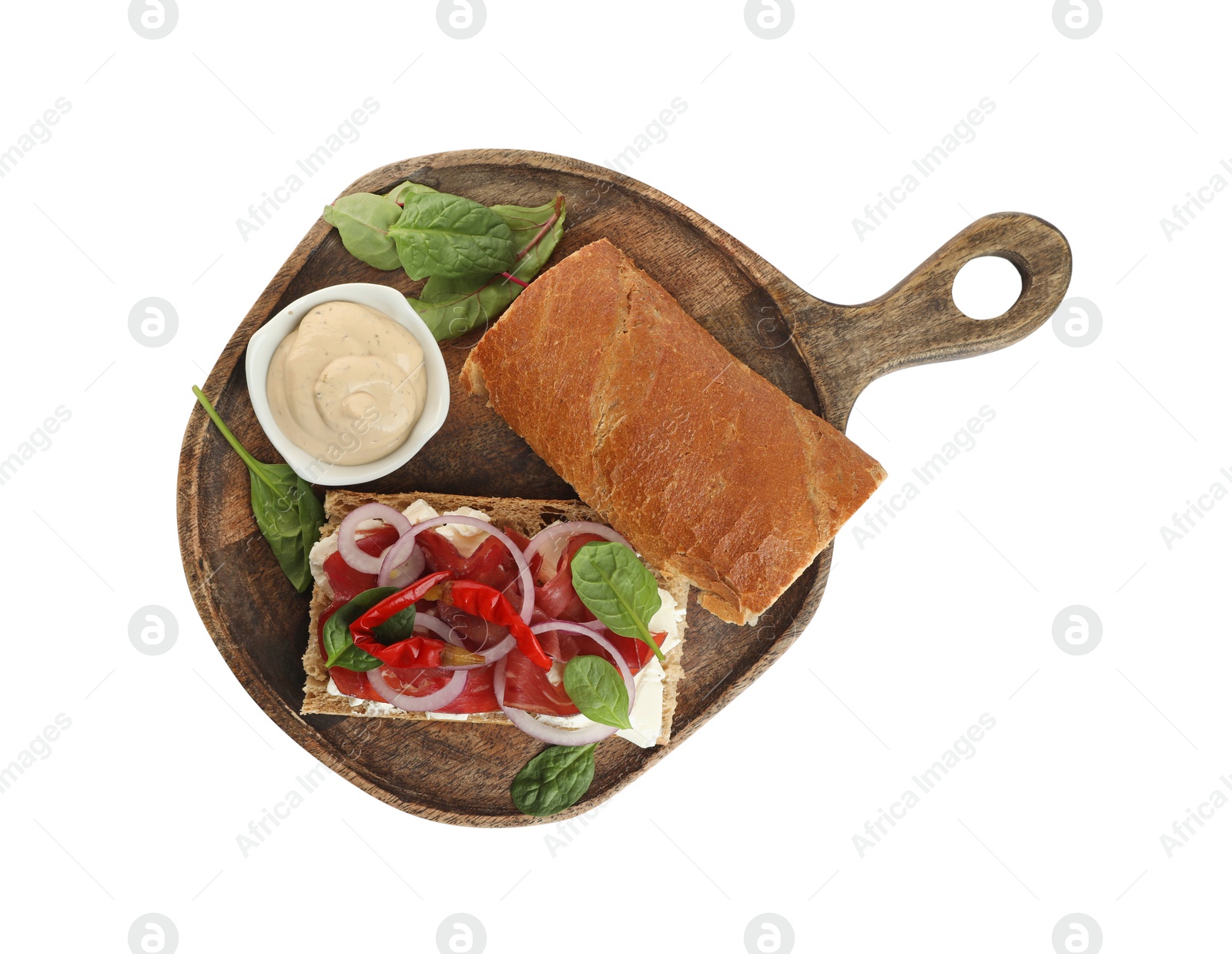 Photo of Delicious sandwich with bresaola, cream cheese, chili pepper and sauce isolated on white, top view
