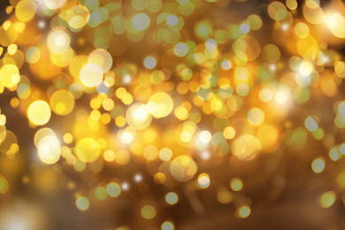 Image of Blurred view of gold lights as abstract background, bokeh effect
