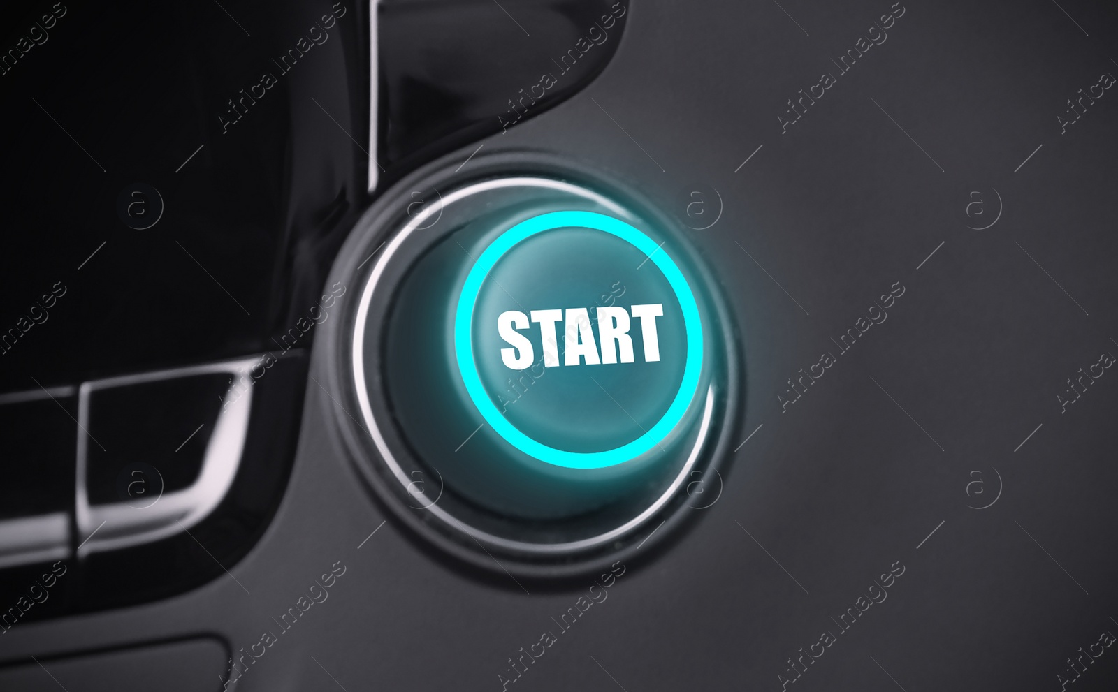 Image of Start button on dashboard in car, closeup