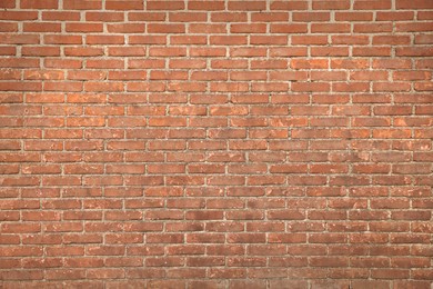 Photo of Texture of red brick wall as background