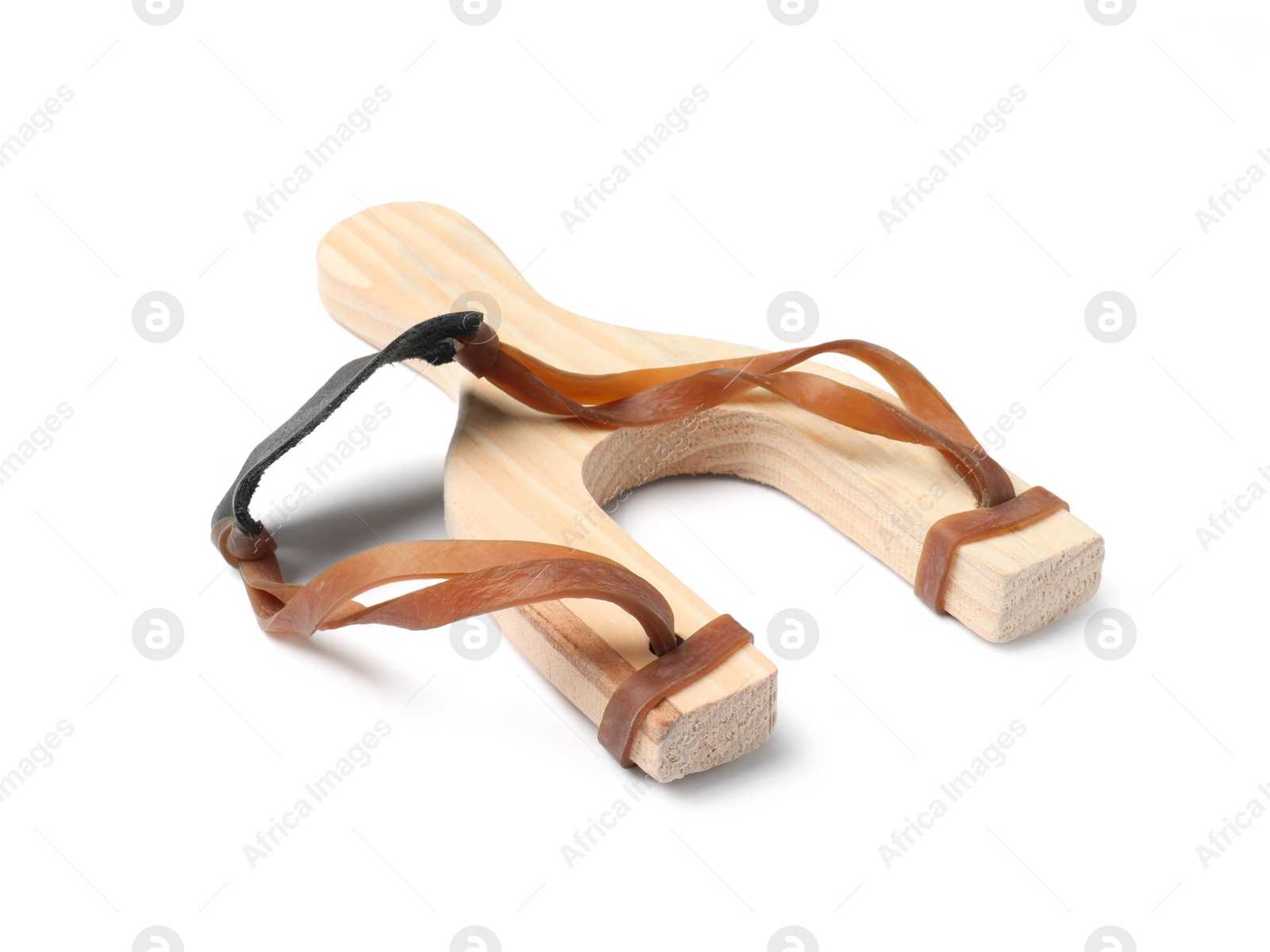 Photo of One wooden slingshot with leather pouch isolated on white