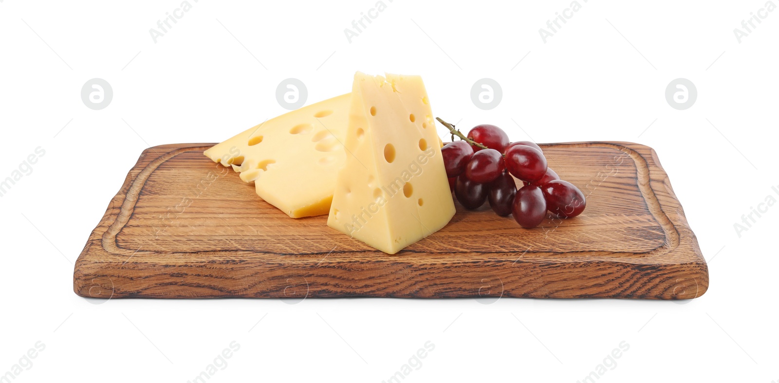 Photo of Pieces of delicious cheese and grapes isolated on white