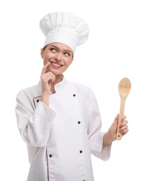 Happy chef in uniform holding wooden spoon on white background