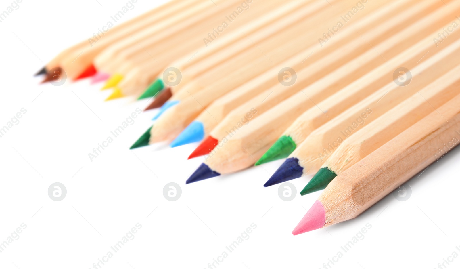 Photo of Different color pencils on white background. School stationery