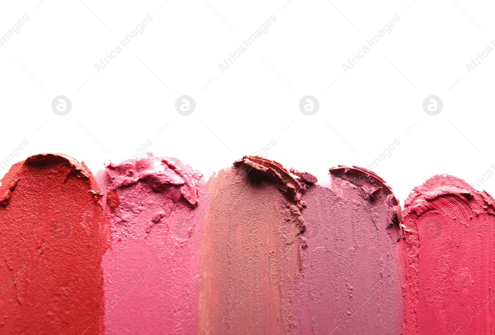 Photo of Lipstick smears isolated on white, top view. Space for text