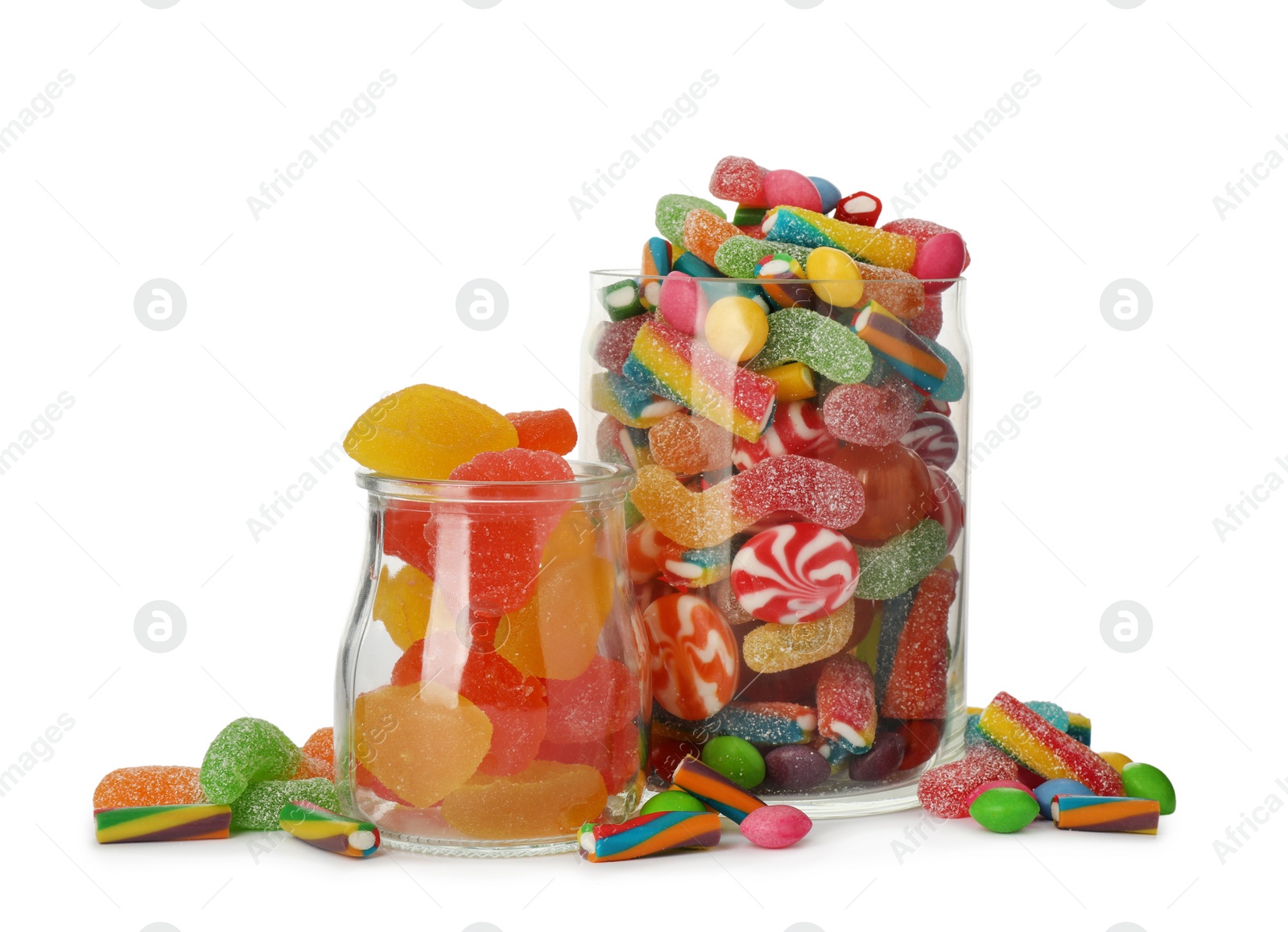 Photo of Glass jars with different candies on white background