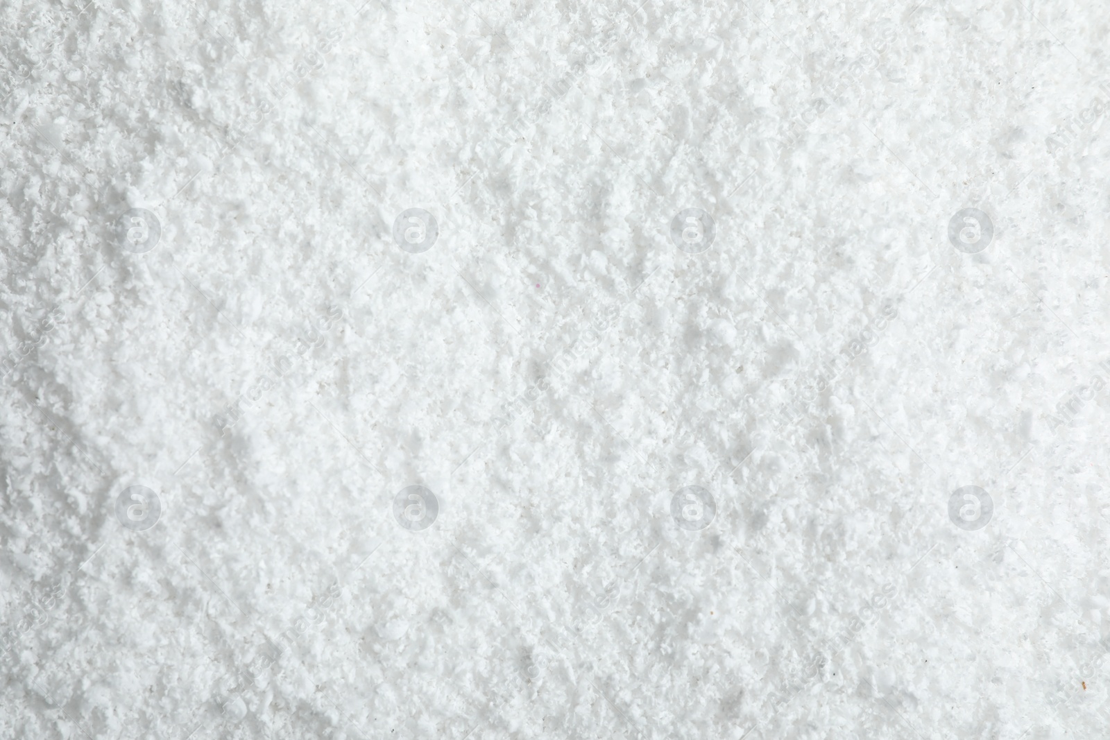 Photo of Pile of white snow as background, top view