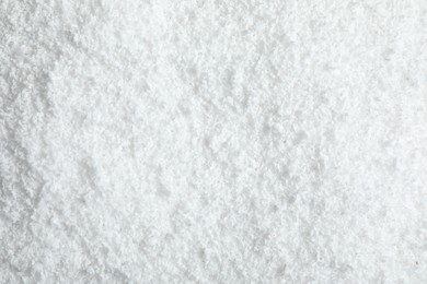 Photo of Pile of white snow as background, top view