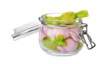 Photo of Glass jar with candies in colorful wrappers isolated on white