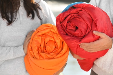 Photo of Campers with sleeping bags, closeup. Professional equipment