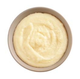 Bowl with delicious semolina pudding on white background, top view