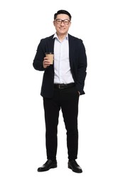 Businessman in suit with cup of drink on white background