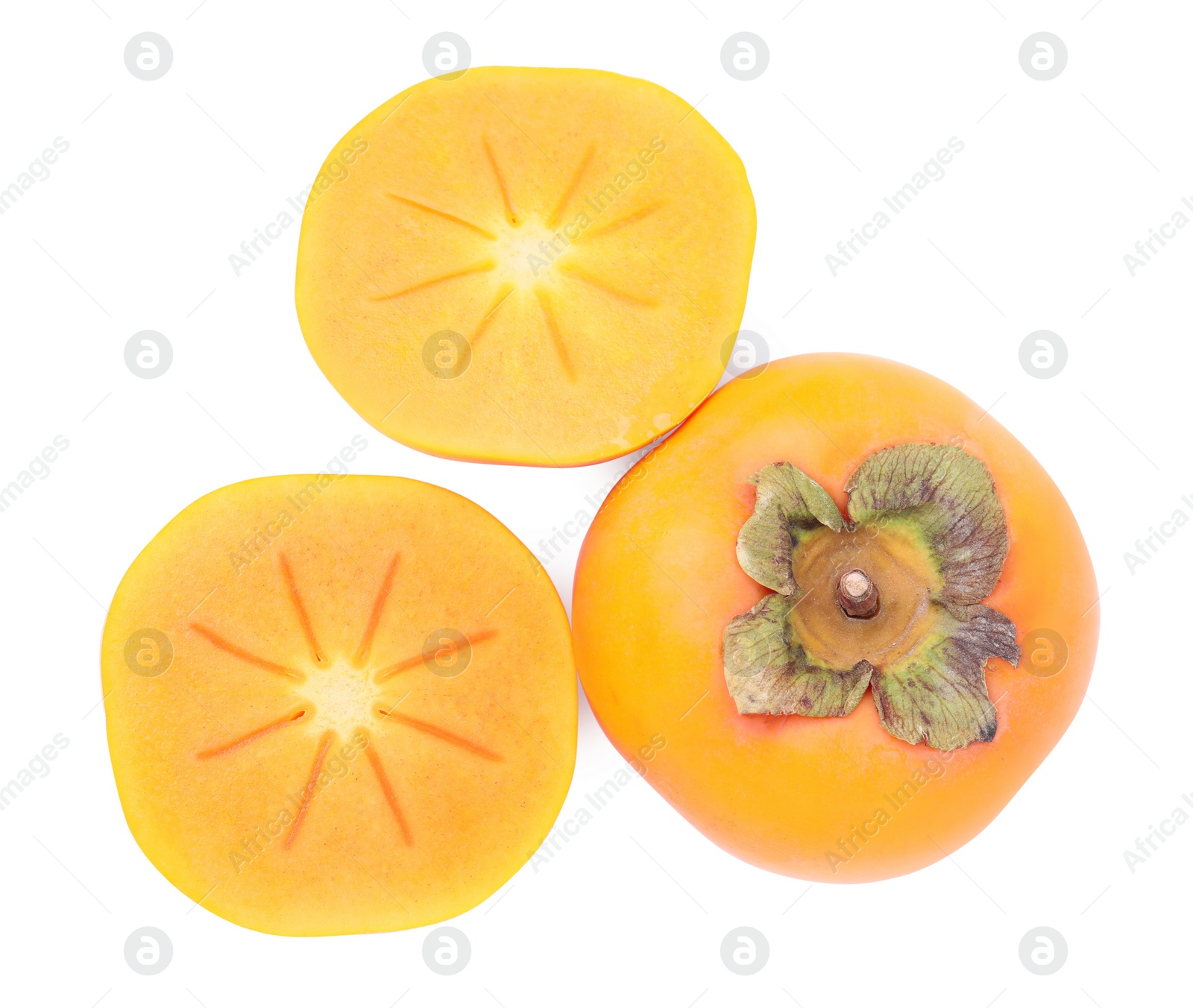 Photo of Whole and cut delicious ripe juicy persimmons on white background, top view