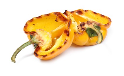 Halves of grilled yellow bell pepper isolated on white