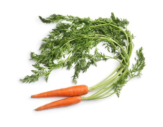 Photo of Fresh ripe carrots on white background, top view