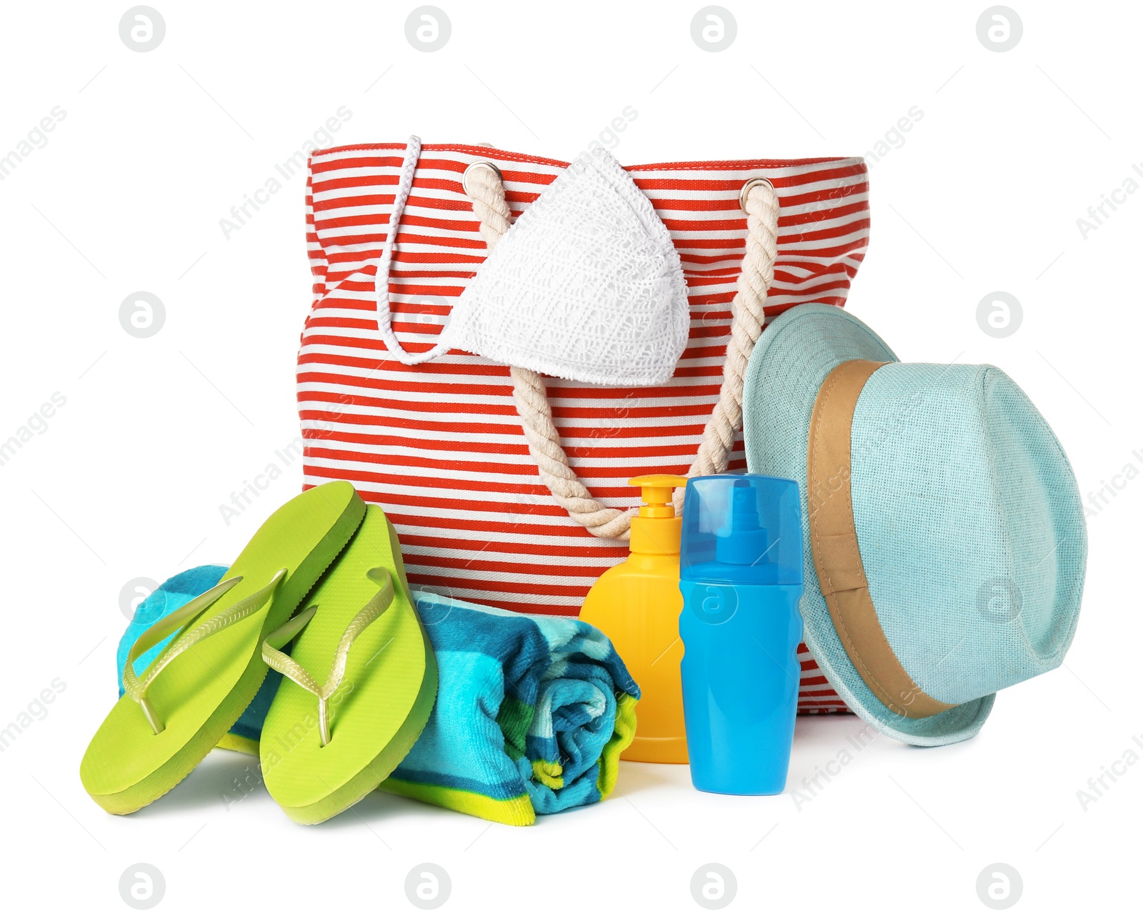 Photo of Set of different beach accessories isolated on white