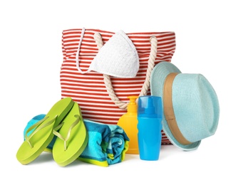 Photo of Set of different beach accessories isolated on white