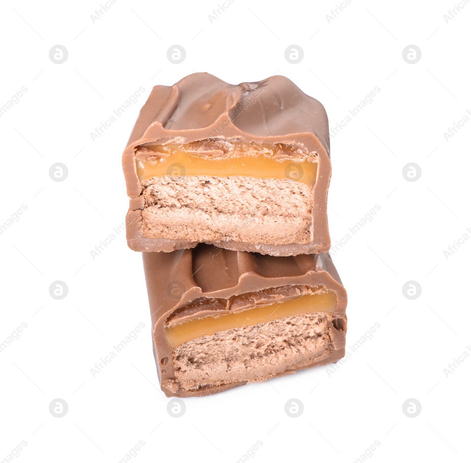 Photo of Pieces of tasty chocolate bar with nougat on white background