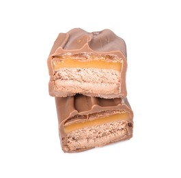 Pieces of tasty chocolate bar with nougat on white background