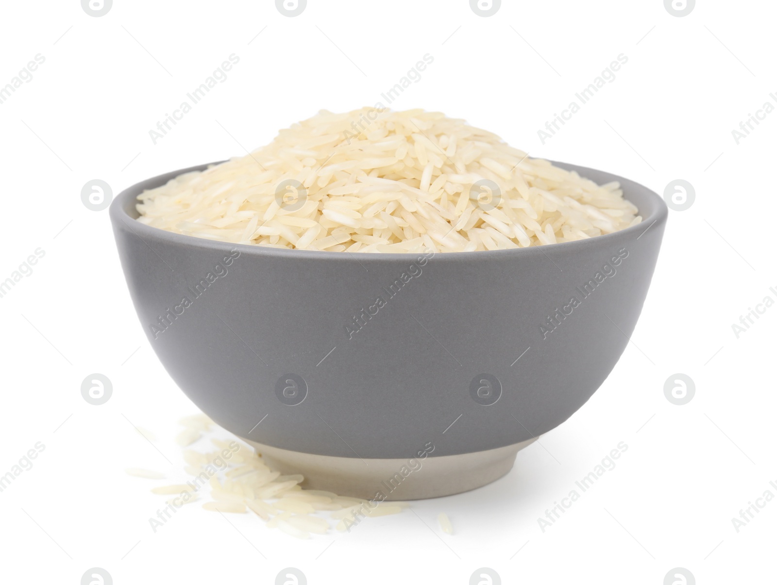 Photo of Raw rice in bowl isolated on white