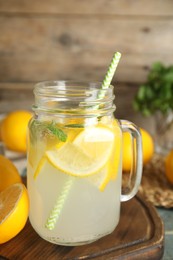 Cool freshly made lemonade in mason jar on table