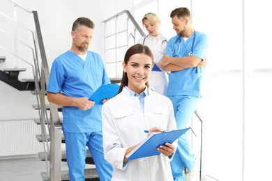 Doctors and medical assistants in clinic. Health care service