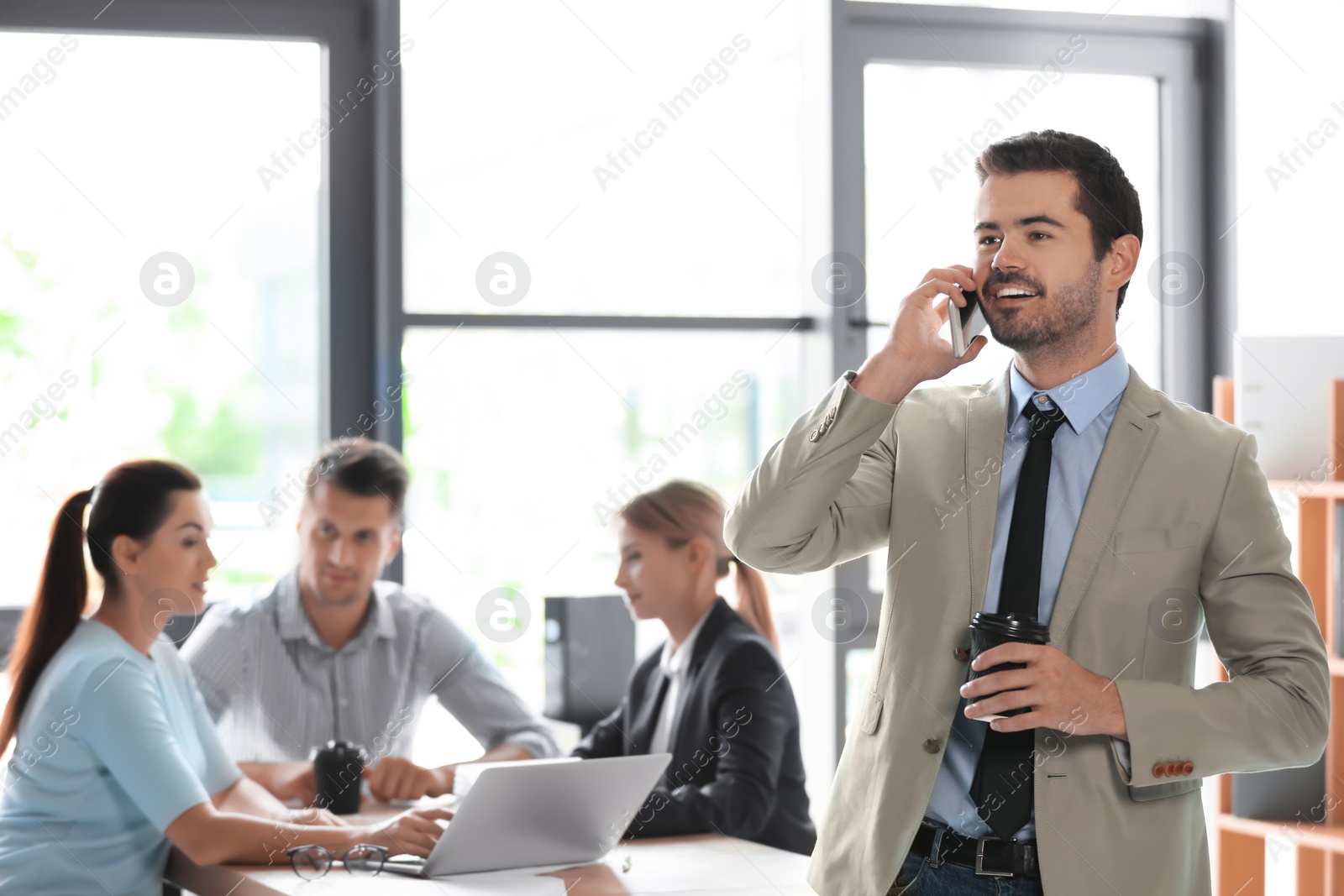 Photo of Office employees having business training at workplace