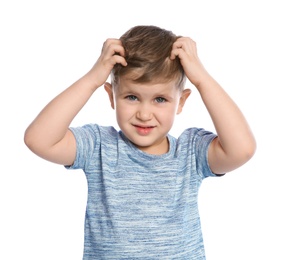 Little boy scratching head on white background. Annoying itch