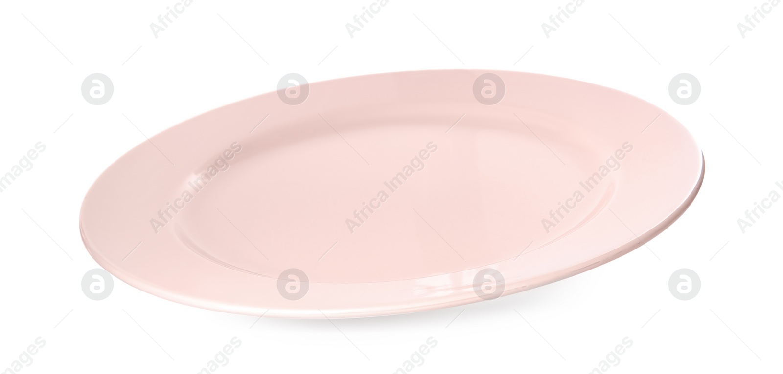 Photo of Clean light pink plate isolated on white