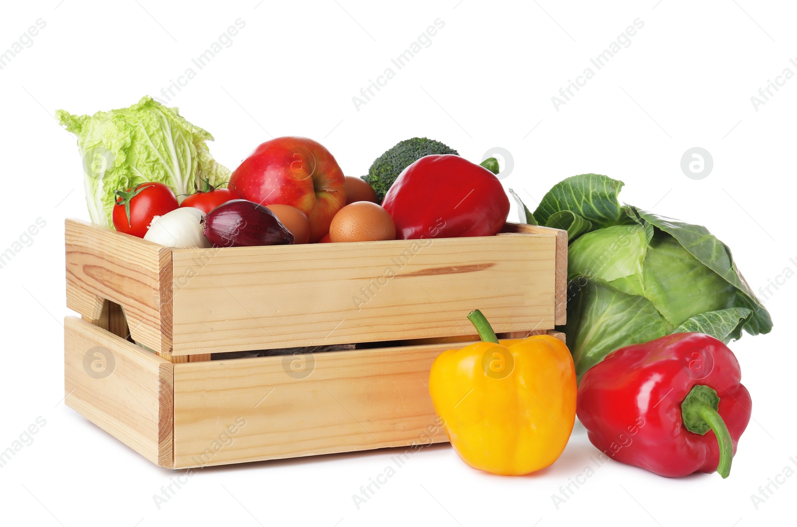 Photo of Wooden crate full of fresh products on white background