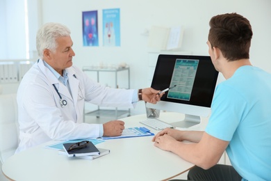 Man with health problems visiting urologist at hospital