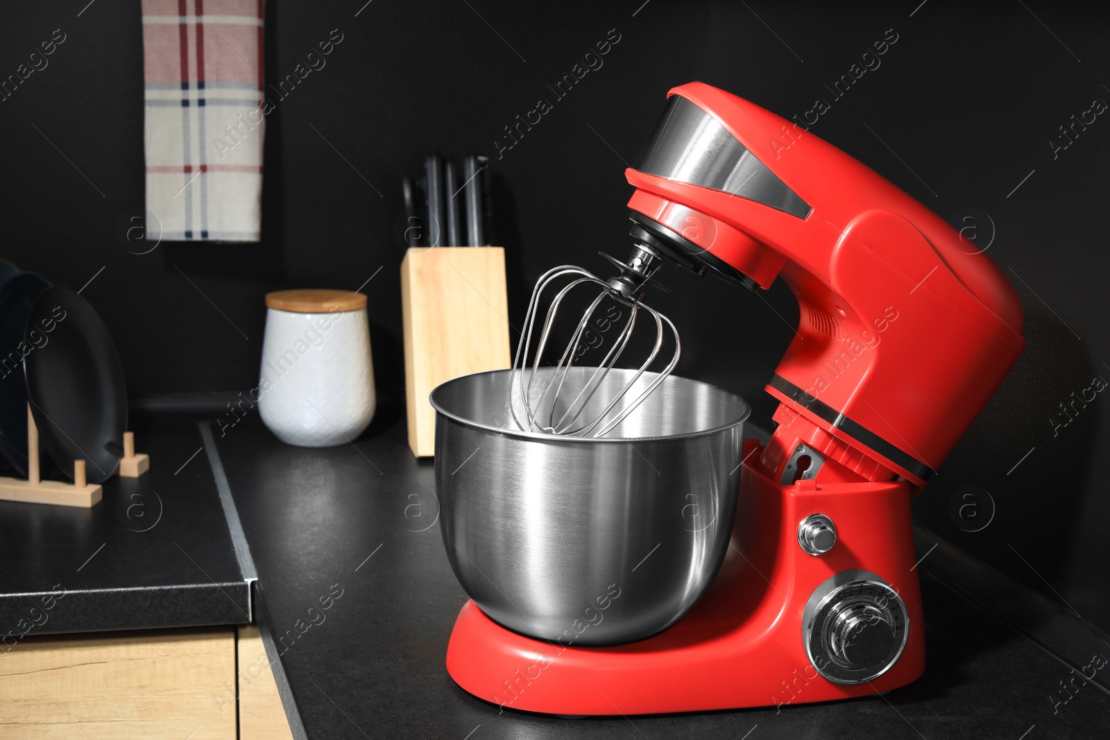 Photo of Modern stand mixer on countertop in kitchen