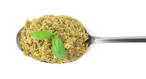 Photo of Spoon with delicious pesto sauce and basil isolated on white, top view