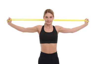 Woman exercising with elastic resistance band on white background