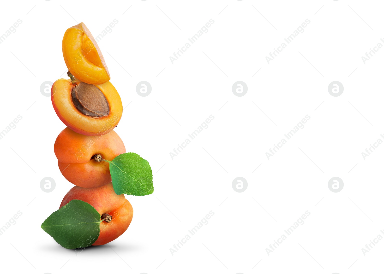 Image of Stack of fresh ripe apricots on white background