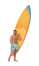 Happy man with orange SUP board on white background