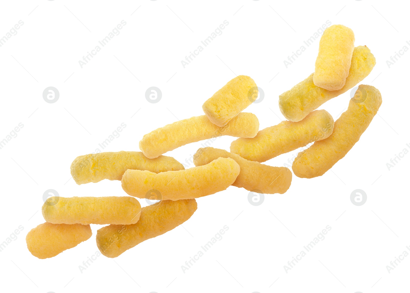 Image of Many tasty corn sticks falling on white background