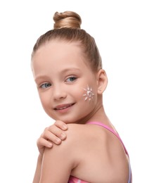 Happy girl with sun protection cream on her face isolated on white