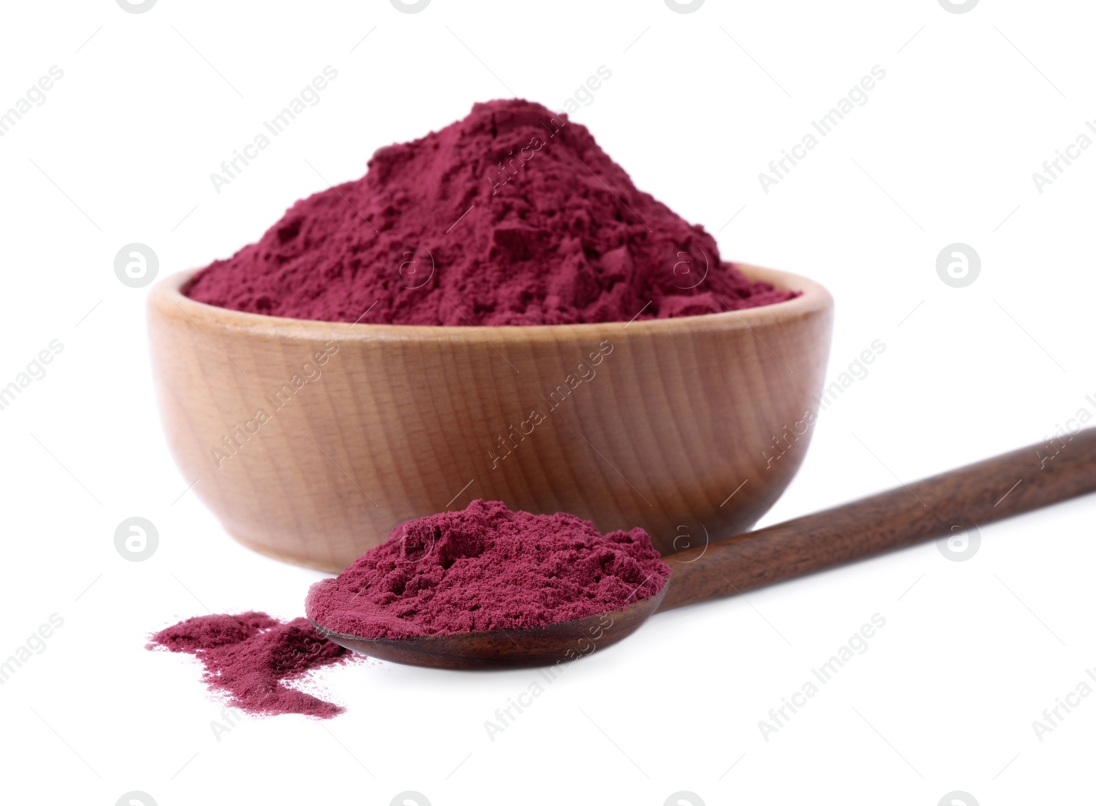 Photo of Wooden spoon and bowl of acai powder on white background