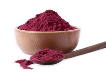 Wooden spoon and bowl of acai powder on white background